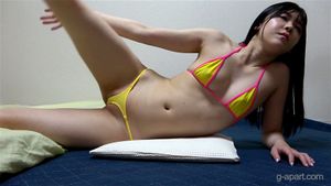 Japanese Girl in Yellow and Pink Bikini is Exercising to Lose Weight
