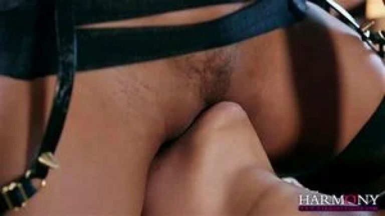 Lesbians making out in fetish scene