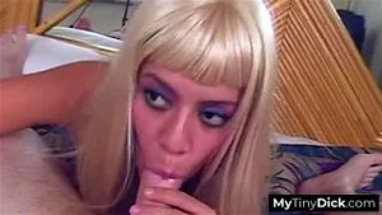 A sexy blonde eagerly sucking on his pathetic small dick