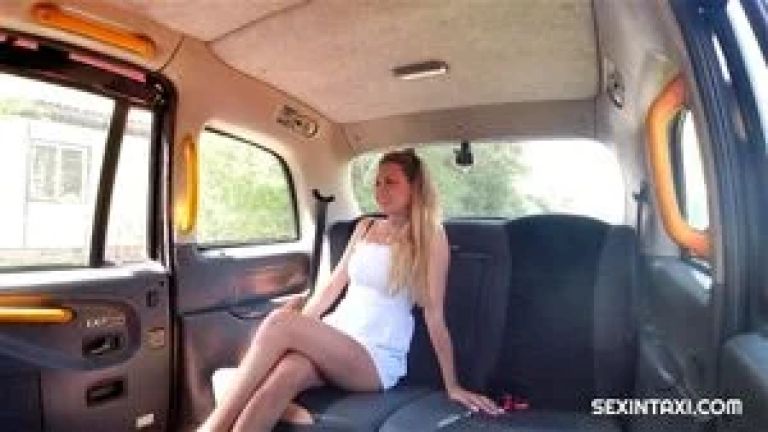 Sexy blonde has a hot ride in a taxi