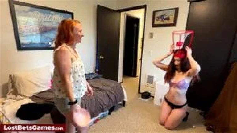 Redhead lesbians Ruby and Raven bounce onto the court