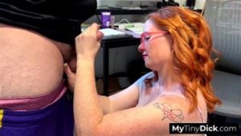 Redhead teacher bursts out laughing while sucking his small cock
