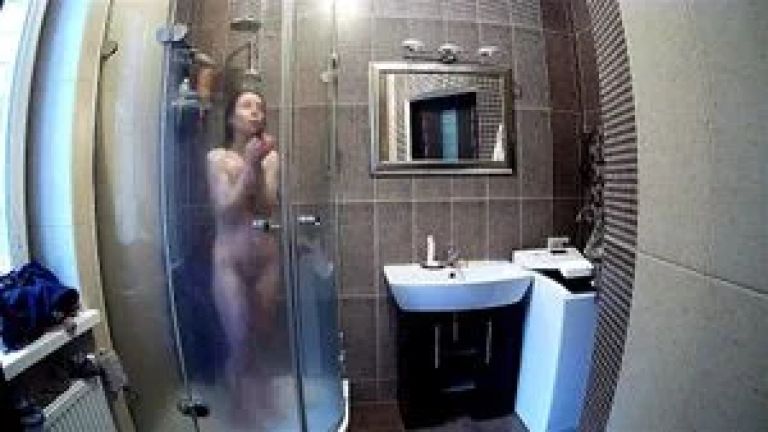 Petite brunette Stella naked and in the shower